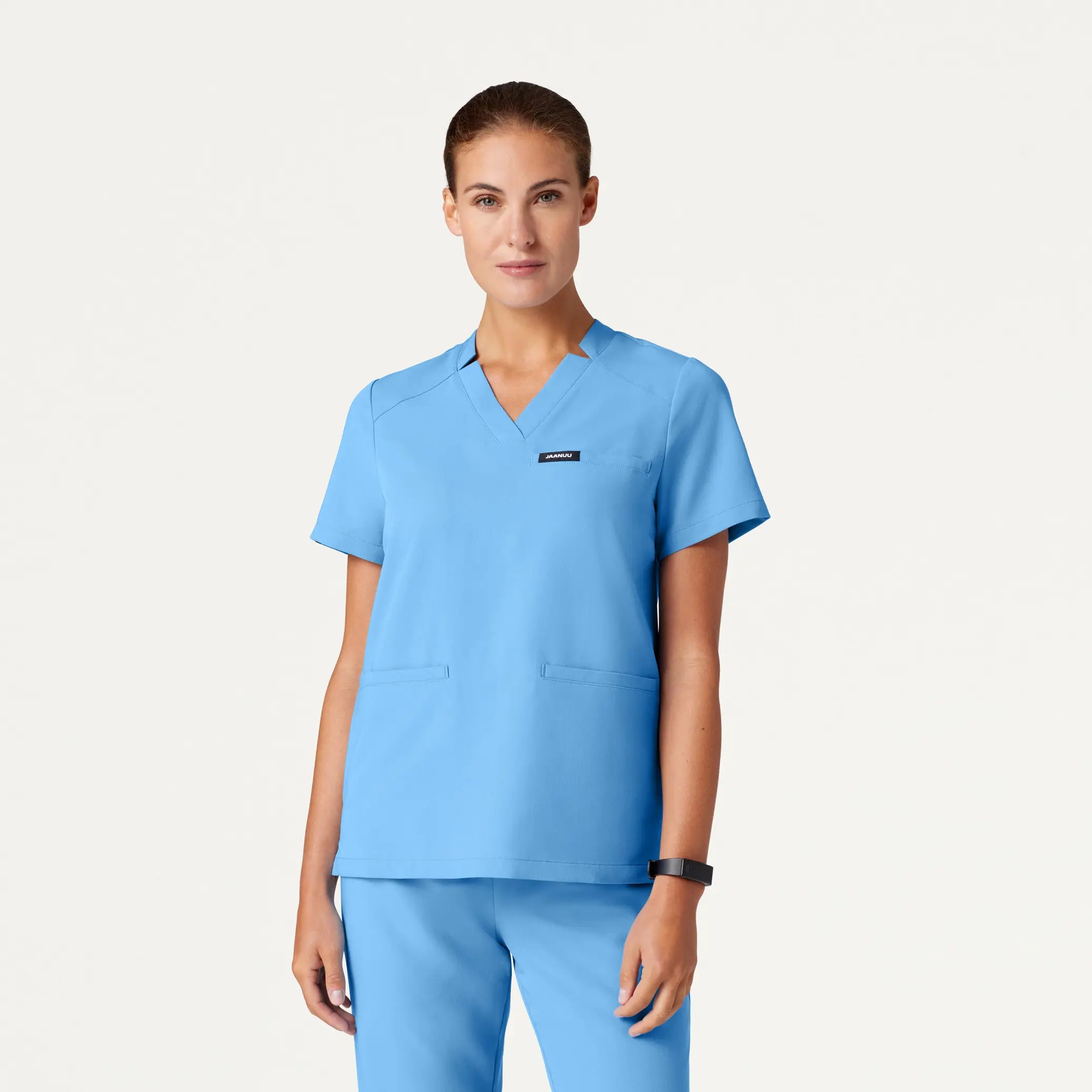 Jaanuu Women's Helia Notched V-Neck Scrub Top - Sky Blue